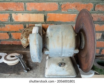 Old Electric Sander On Workbench In Rustic Barn