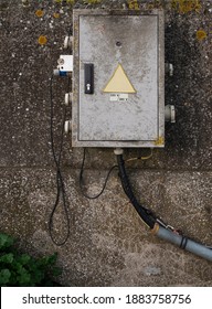 Old Electrical Box Outside On A Concrete Wall