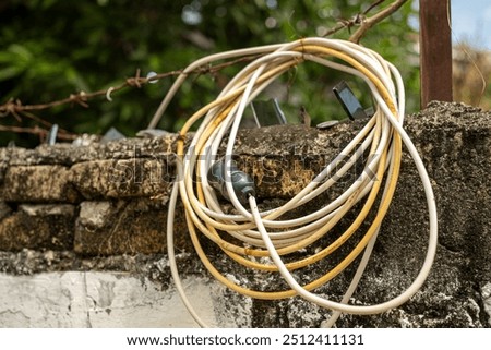 Similar – Image, Stock Photo Top hangs in barbed wire fence