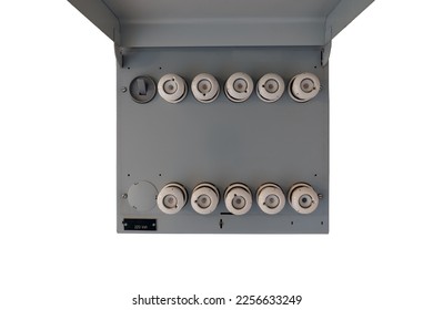 Old electrical fuse box with porcelain fuses in an older dwelling house, power and energy concept. Isolated on white background. - Shutterstock ID 2256633249