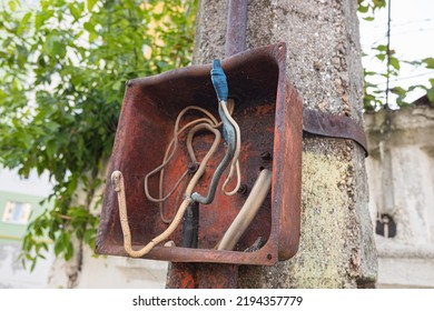 Old Electrical Metal Box With A Wires And A Power Cable