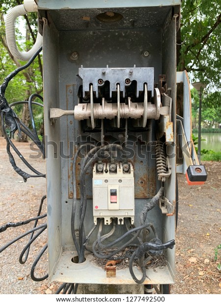 Old electricity\
breaker switch open box