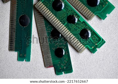 Old electronic boards for retro games. Cartridges for retro game consoles. Retro design. Concept art. old chips.