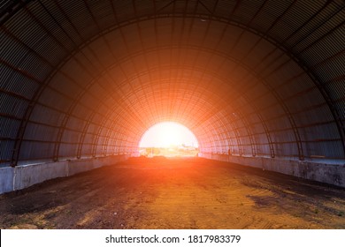 Old empty abandoned rusty metal arched hangar - Powered by Shutterstock