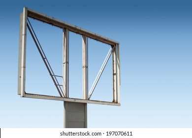 Old Empty Billboard Against The Blue Sky