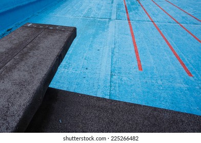 Old Empty Pool With Diving Board 