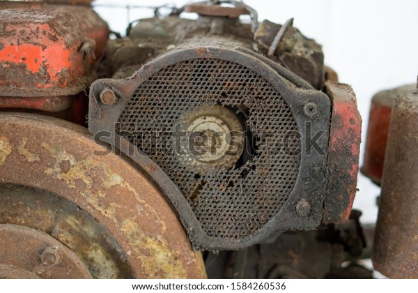 Old engine motor of water\
pump.