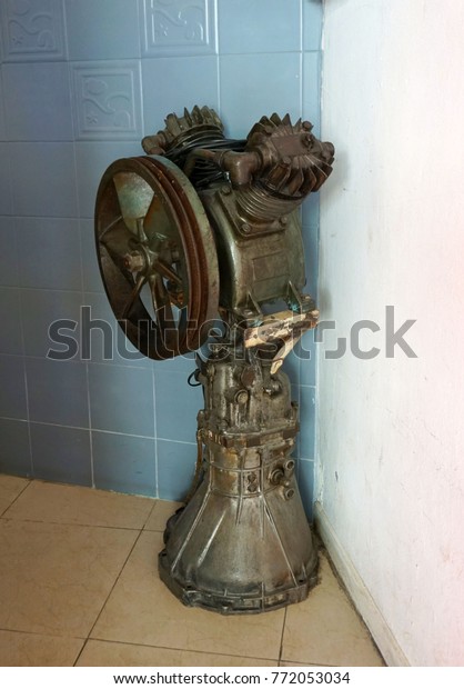 Old engine motor,machine decorated in customer
service room