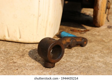 Old Engine Starter Or Hand Crank To Start Old Diesel Engines With Petrol Can On Its Background