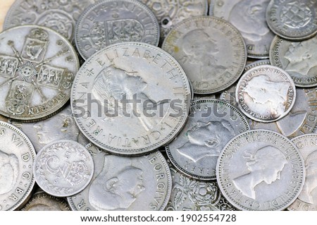 Old English British silver pre-decimal coins, shillings, florins and three penny coins