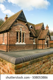 Old English School Building. A Small Old Brick Built Victorian School House In A Quiet Rural English Location.