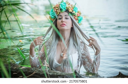 Old European magic, Mystical Pagan scene, woman in lake, rite. Magic divination in water, undina 
