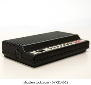 An Old, External Dial-up Modem. This Is The Type Of Modem That Used A Standard Telephone Line. It Supports The V.92 Standard. Room For Text Above.