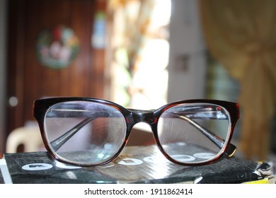 Old Eyed Reading Glasses Close Up Shot Top On A Box Angle Shot