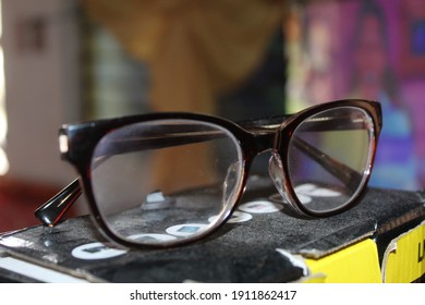 Old Eyed Reading Glasses Close Up Shot Top On A Box Angle Shot