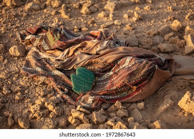 Old fabric tent thrown in the desert