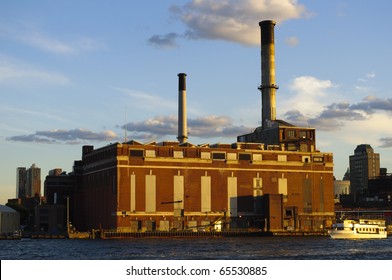 Old Factory Seen From Ferry Outside Of Manhattan, New York City, New York.