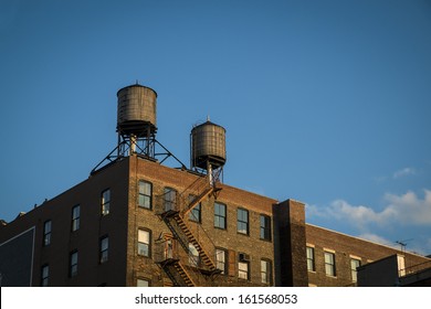 Old Factory With Water Towers On Roof, New York City