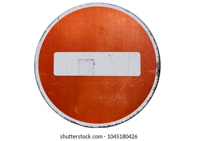 Old faded scratched round red-orange road sign 'No entry' isolated on white.