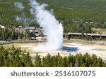 Old Faithful erupt from high ground