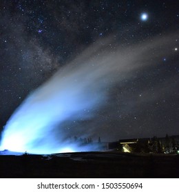 Old Faithful Geyser At Night With The Milky Way