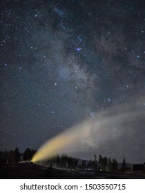 Old Faithful Geyser At Night With The Milky Way