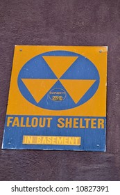 Old fallout shelter sign on the side of a building - wouldn't want to be person 791!
