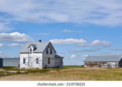 An Old Farm House And Building On The Saskatchewan Prairie