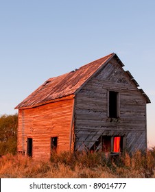 Old Farm House On The Prairie In Southern Alberta At Sunrise