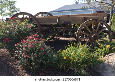 Old Farm Wagon Used As A Garden Planter