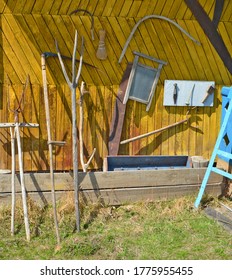 Old Farming Tools At Walls Of The House