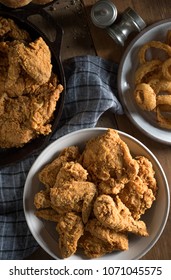 Old Fashion, Country Styled, Southern Fried Chicken Dinner With Onion Rings And Biscuits.