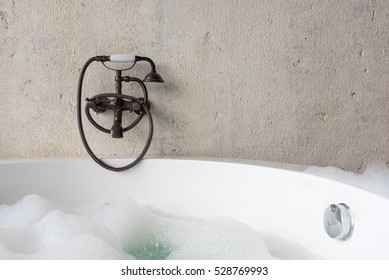 Old Fashion Faucet Over Jacuzzi Bath Tub