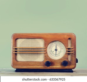 Old Fashion Style Vintage Radio Over Retro Mint Background With Copyspace Design. Hipster Design Audio Music Radio.