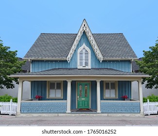 Old Fashioned American Gothic Style Small House With Gable And Full Width Veranda