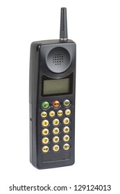 Old fashioned black mobile phone on plain background