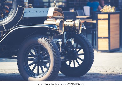 Old Fashioned Car On The Street Of Torun, Poland