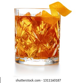 Old Fashioned Cocktail Garnished With Orange Twist Isolated