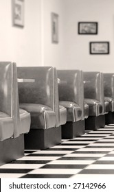 Old Fashioned Diner With Booths And Checkered Tile Floor