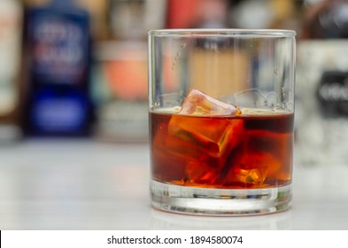 Old Fashioned Glass With Scotch Whisky And Ice Cubes On The Bar, Exclusive Drink