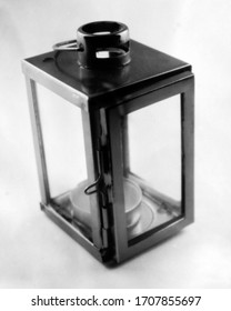 Old Fashioned Lantern On A Light Background,, This Black And White Photo Was Taken With A Pinhole Camera, Which Corresponds To The Camera Characteristic 