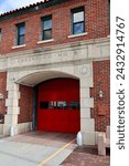 Old fashioned red brick fire station in the city