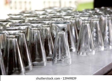 Old Fashioned Soda Fountain Glasses Lined Up On The Marble Counter Of An Authentic Vintage Soda Fountain Store, Waiting To Be Used (shallow Focus).