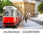 Old fashioned tram goes by the street of Vienna. Vienna is a capital and largest city of Austria