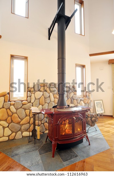 Old Fashioned Wood Burning Stove Roaring Royalty Free Stock Image