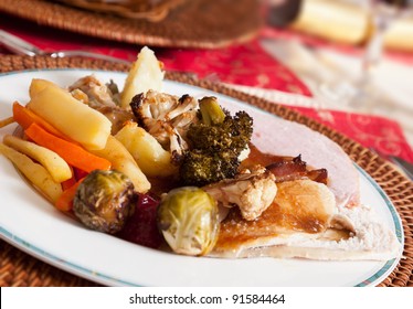 Old fashioned xmas lunch plate of turkey with vegetables and gravy