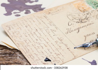 Old  Feather Pen On  Handwritten Letter Background