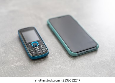 old feature phone with new smartphone - Shutterstock ID 2136532247