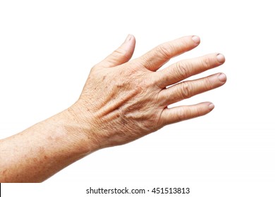 Old Female Hand Full Of Freckles Isolated