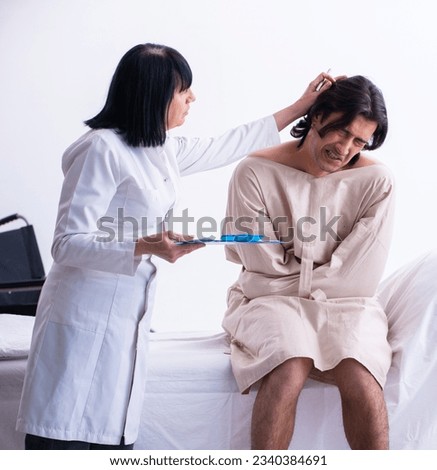 Old female psychiatrist visiting young male patient
